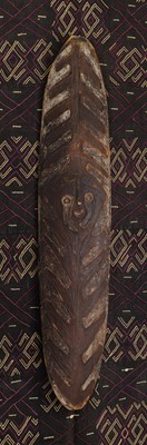 Lot 703 - A Sepik River carved tiki board