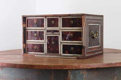 Lot 124 - An Indo-Portuguese rosewood, tortoiseshell and ivory table cabinet