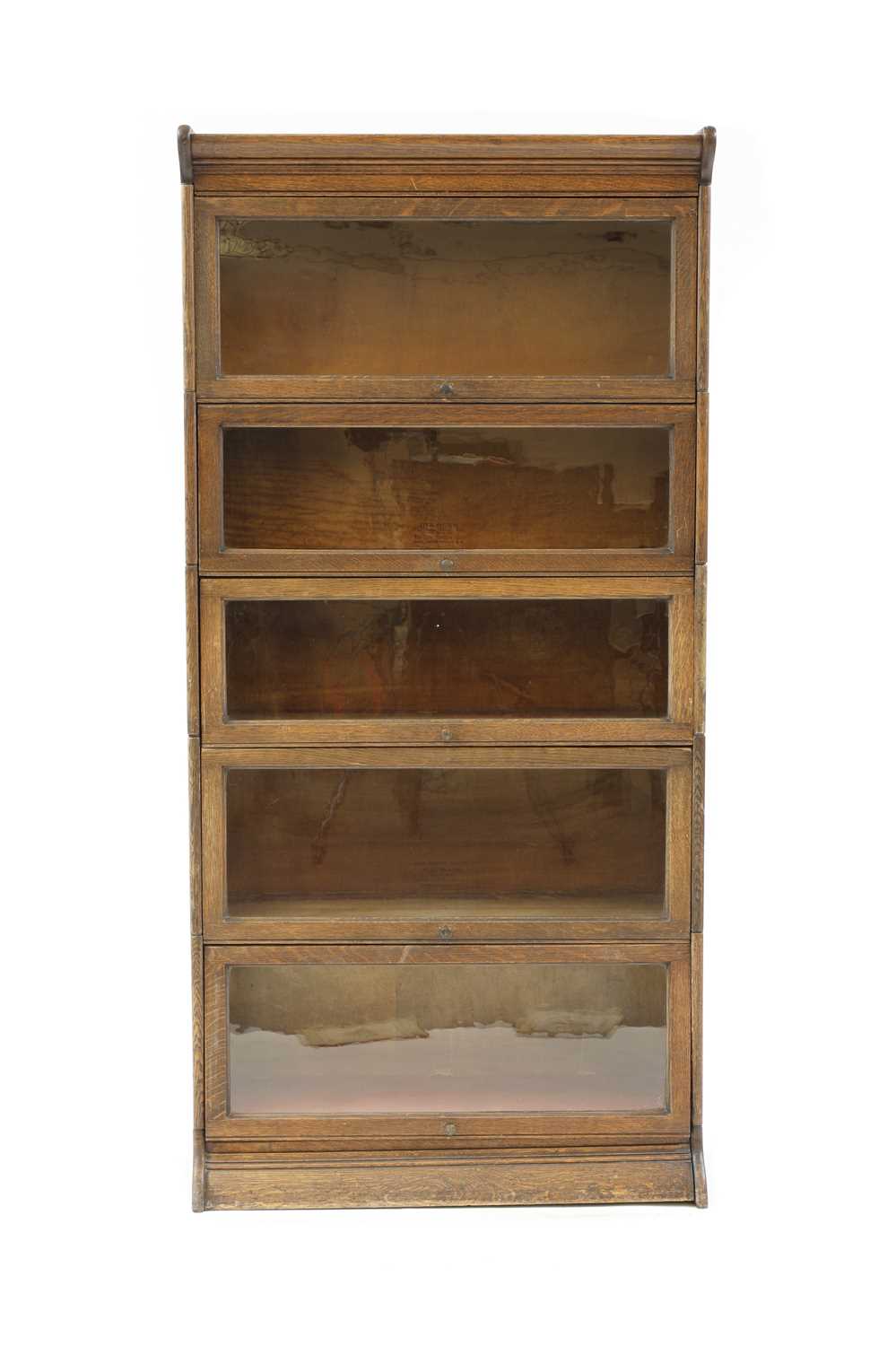 Lot 426 - An oak five section modular bookcase by Gunn