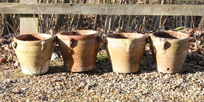 Lot 534 - A set of four small terracotta pots