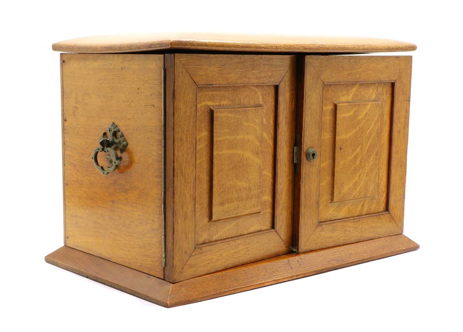 Lot 260 - An Edwardian honey oak stationery cabinet