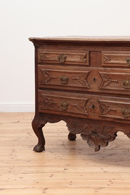 Lot 238 - A carved walnut commode