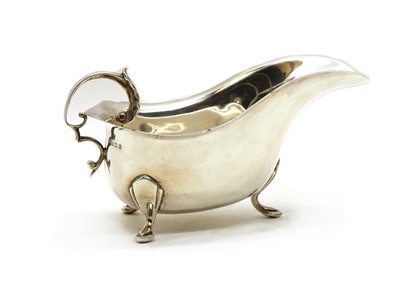 Lot 9 - A George III style silver sauce boat