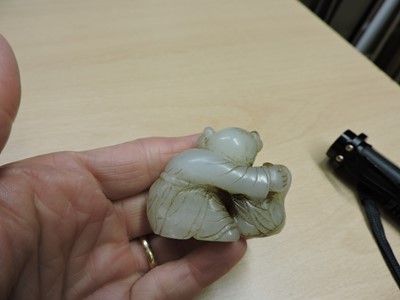 Lot 142 - A Chinese jade carving of a boy with a goose