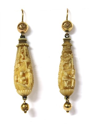 Lot 19 - A pair of Victorian carved ivory drop earrings