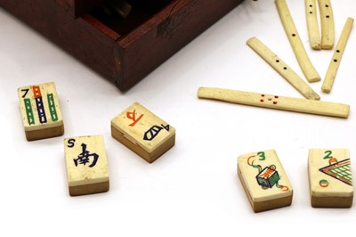Lot 119 - A cased mahogany mahjong set