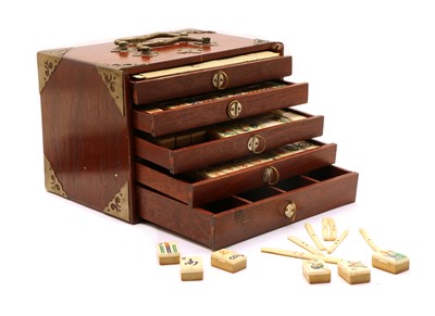 Lot 119 - A cased mahogany mahjong set