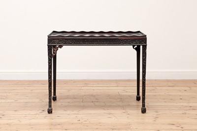 Lot 446 - A George II-style mahogany silver table