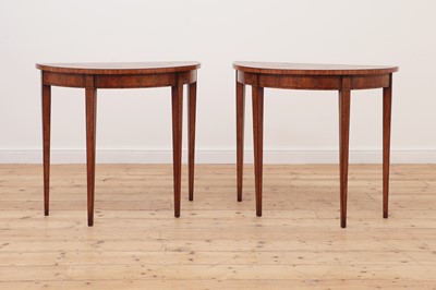 Lot 475 - A pair of George III-style inlaid satinwood demilune pier tables