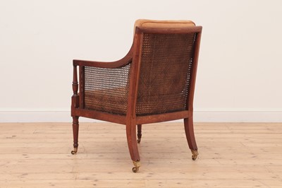 Lot 622 - A George III mahogany bergère library chair
