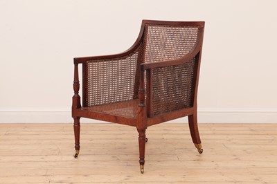 Lot 622 - A George III mahogany bergère library chair