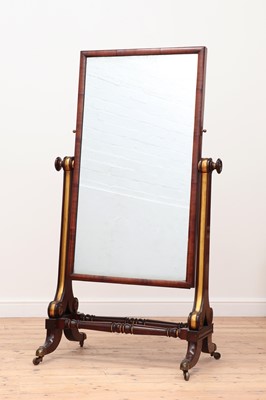 Lot 643 - A mahogany and parcel-gilt cheval mirror