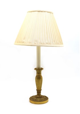 Lot 110 - A gilt bronze candlestick table lamp and shade
