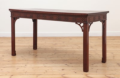 Lot 592 - A George lll and later mahogany serving table