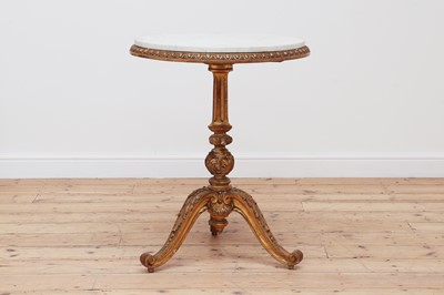 Lot 472 - A George III style carved giltwood and marble top tripod table