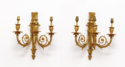 Lot 118 - A pair of French Empire-style three-branch gilt metal wall lights