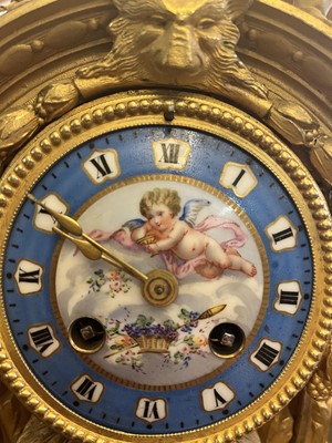 Lot 116 - A French gilt-cased mantel clock