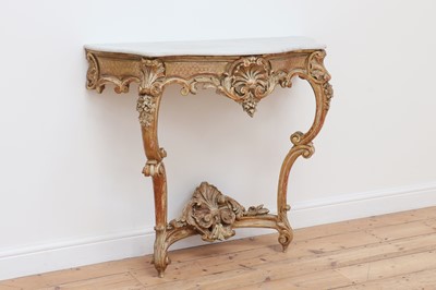 Lot 782 - A Louis XV-style giltwood serpentine console