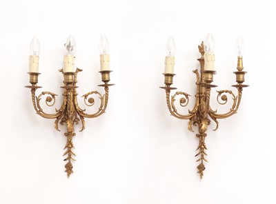Lot 764 - A pair of Continental neoclassical gilt metal wall lights