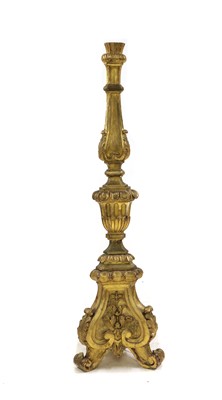 Lot 405 - A 17th century style Italian giltwood torchere