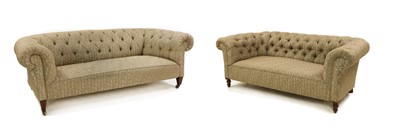 Lot 461 - A near pair of Chesterfield sofas