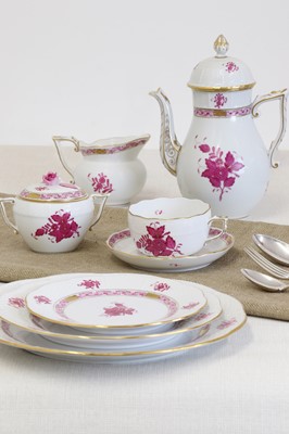 Lot 578 - A porcelain 'Apponyi Purple' part dinner service by Herend