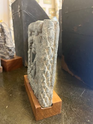 Lot 84 - A grey schist carving of a sage