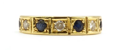 Lot 206 - An 18ct gold sapphire and diamond half eternity ring