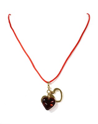 Lot 102 - A Lalique 'Heart Love' three charm pendant