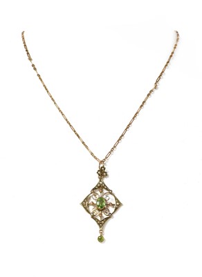 Lot 53 - An Edwardian peridot and split pearl lozenge shaped pendant