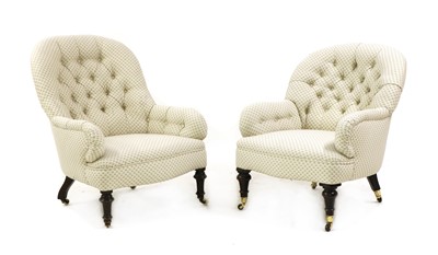 Lot 475 - A near pair of button back armchairs