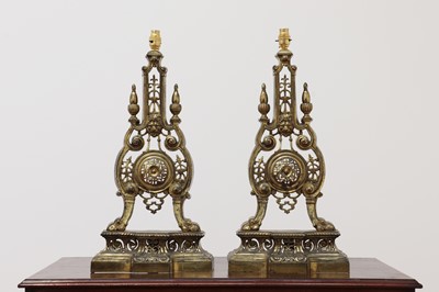 Lot 641 - A pair of gilt-brass chenet table lamps