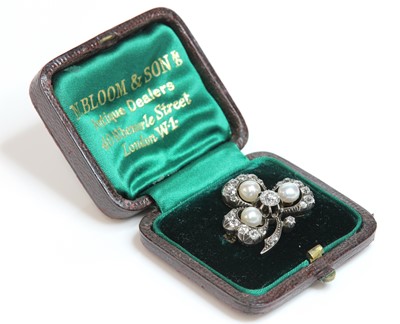 Lot 61 - A Victorian diamond and pearl set shamrock brooch, c.1890