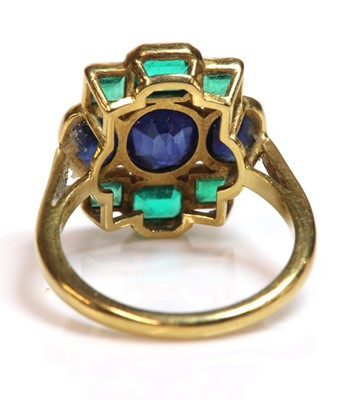 Lot 169 - An Art Deco style sapphire and emerald plaque ring