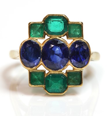 Lot 169 - An Art Deco style sapphire and emerald plaque ring