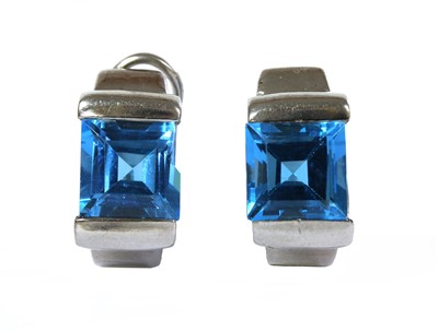 Lot 284 - A pair of white gold blue topaz earrings