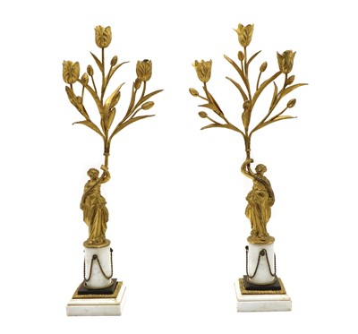 Lot 134 - A pair of gilt-bronze three branch candelabra
