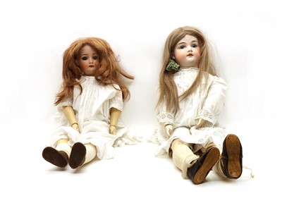Lot 190 - A pair of large bisque head dolls
