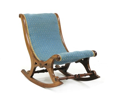 Lot 476 - A Victorian rosewood rocking chair