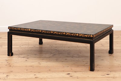 Lot 506 - A black lacquered and gilt chinoiserie low table