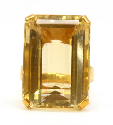 Lot 142 - A gold single stone citrine ring