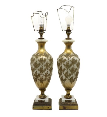 Lot 114 - A pair of glass and gilt-metal table lamps