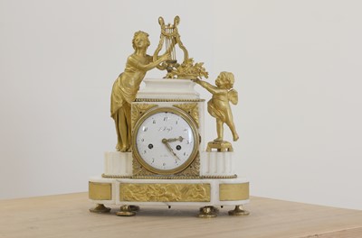 Lot 769 - An ormolu and white marble eight-day mantel clock