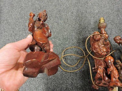 Lot 154 - A collection of Chinese carved wood figures