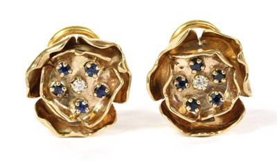 Lot 273 - A pair of gold diamond and sapphire clip earrings