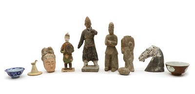 Lot 118 - A collection of Chinese pottery tomb figures