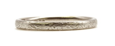 Lot 83 - A platinum wedding ring