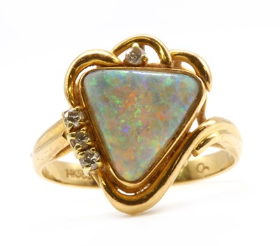 Lot 223 - A gold opal doublet and diamond ring