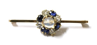 Lot 261 - A moonstone, sapphire and white sapphire cluster