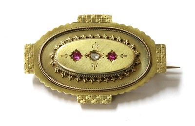 Lot 21 - A Victorian gold diamond and ruby brooch
